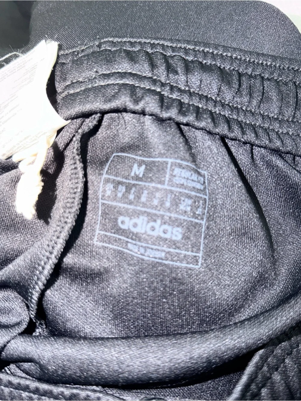 adidas Black Joggers with White Stripe Accents